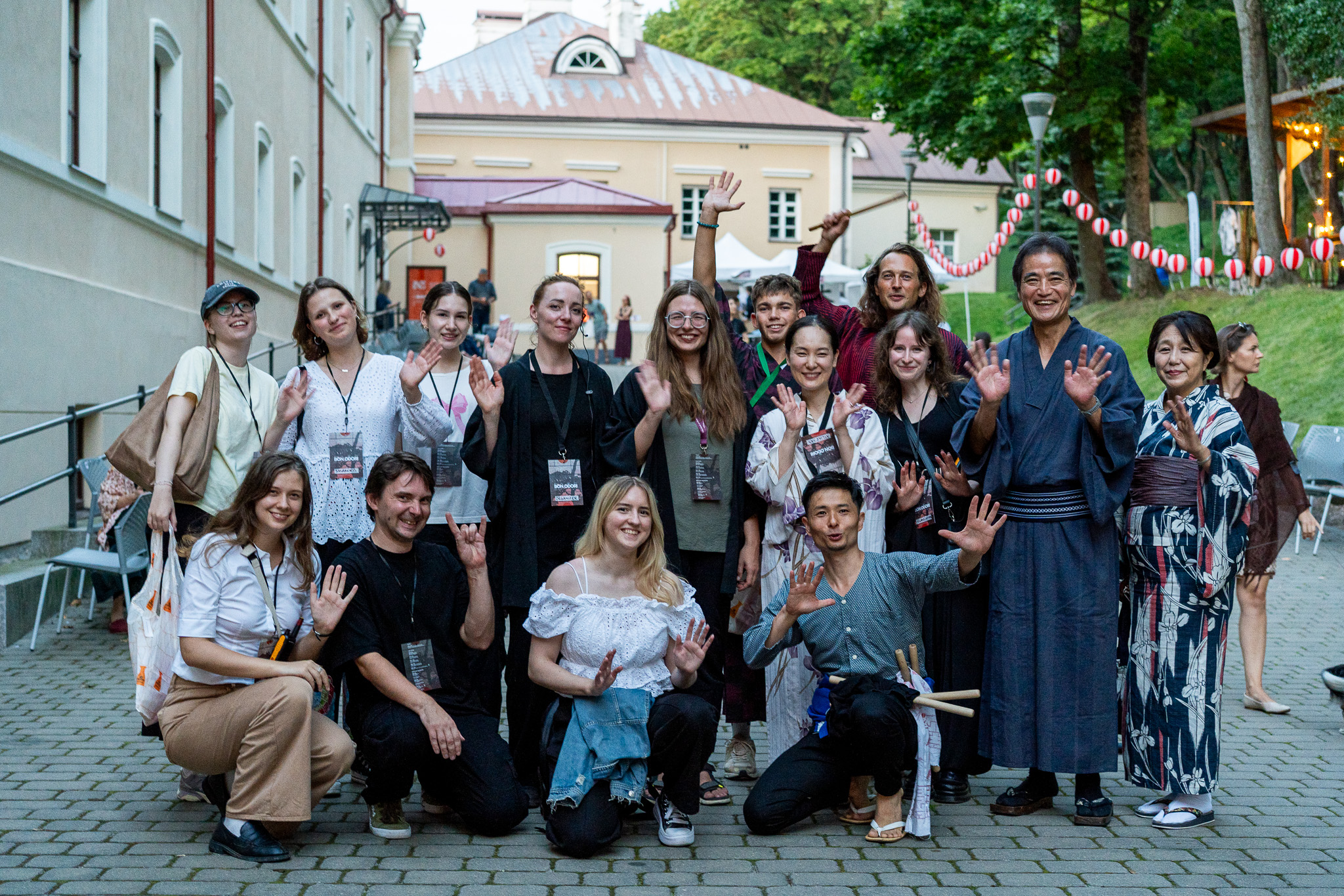 Organisers, guests and volunteers at the Bon Odori festival in Vilnius 2025 pose for a group photograph in front of the House of Histories museum.